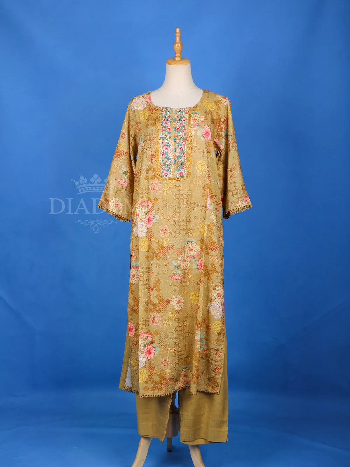 Brown Cotton Straight Cut Salwar Suit Adorned with Floral Prints and Lace With 3/4 Sleeves